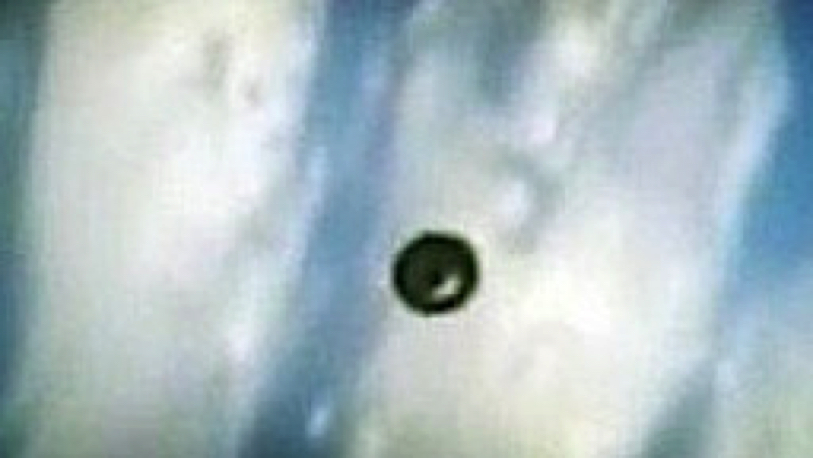 NASA UFO Filmed Above Clouds